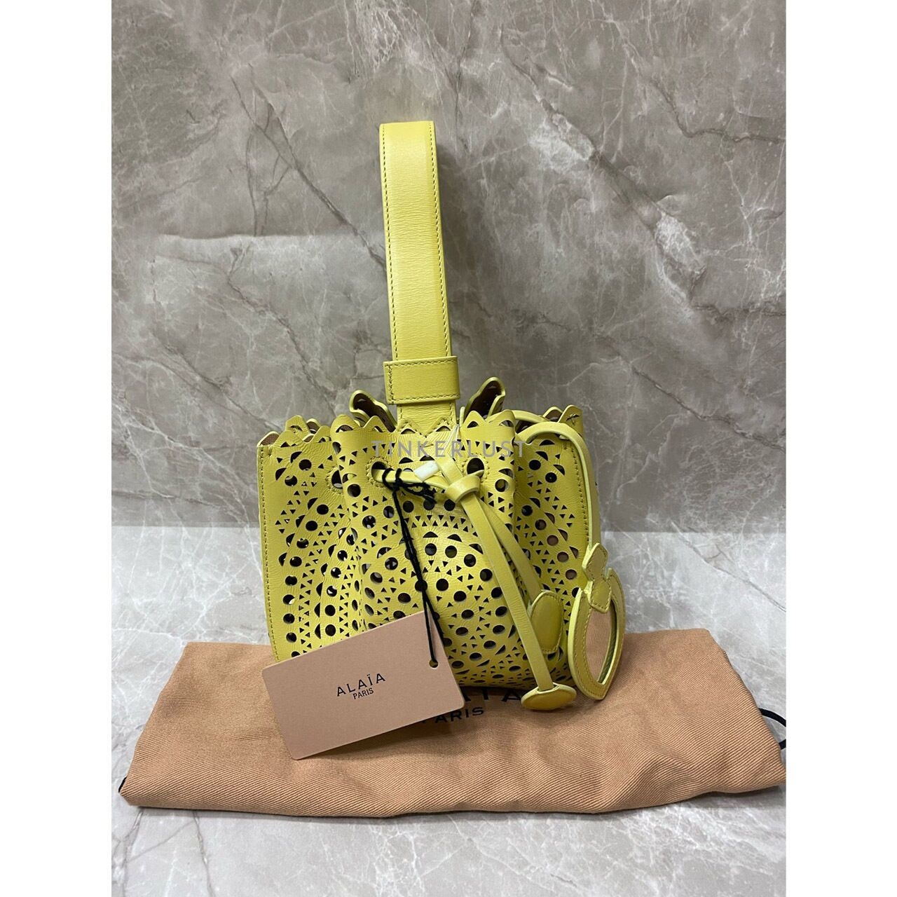 Alaia Mini Laser-Cut Yellow Handbag