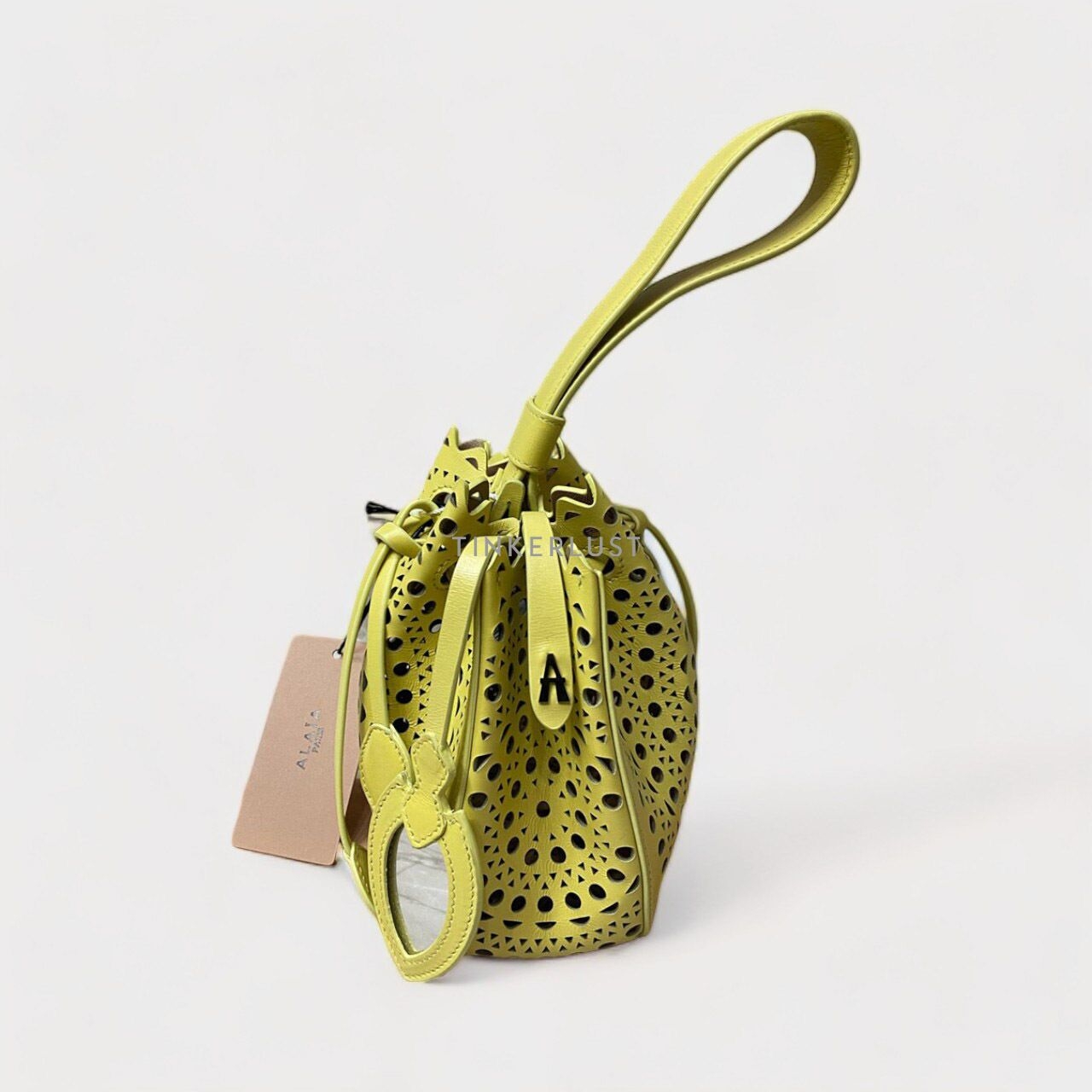 Alaia Mini Laser-Cut Yellow Handbag