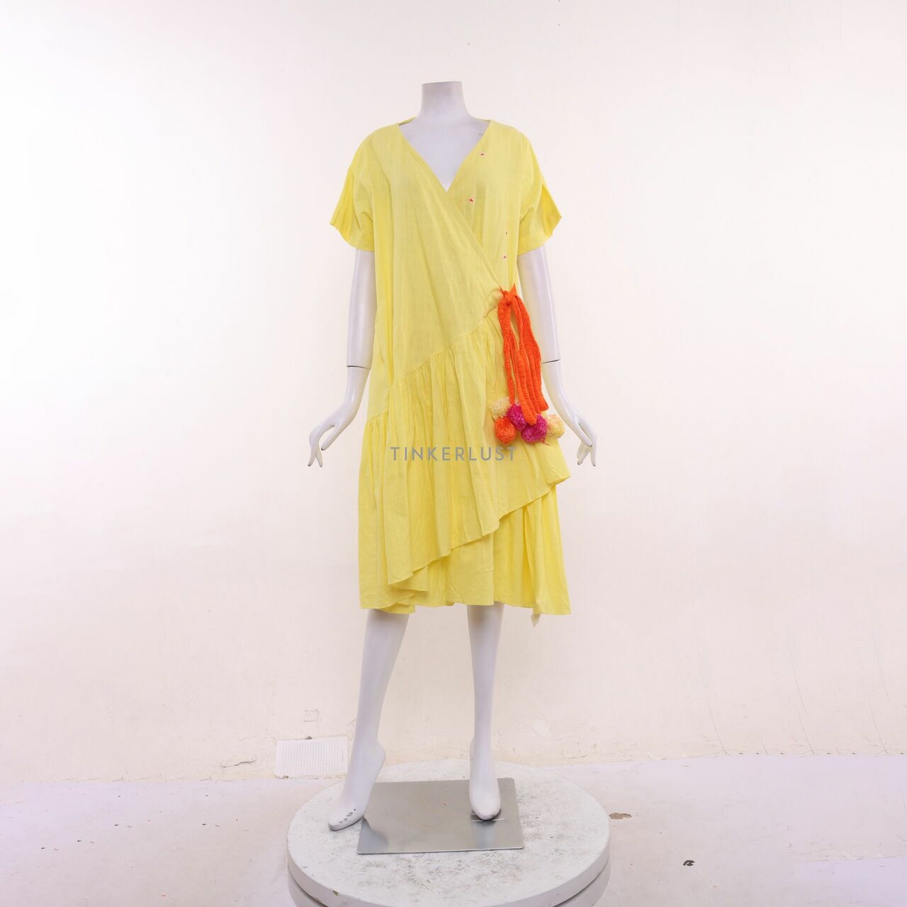 Nagita Slavina Yellow Wrap Midi Dress