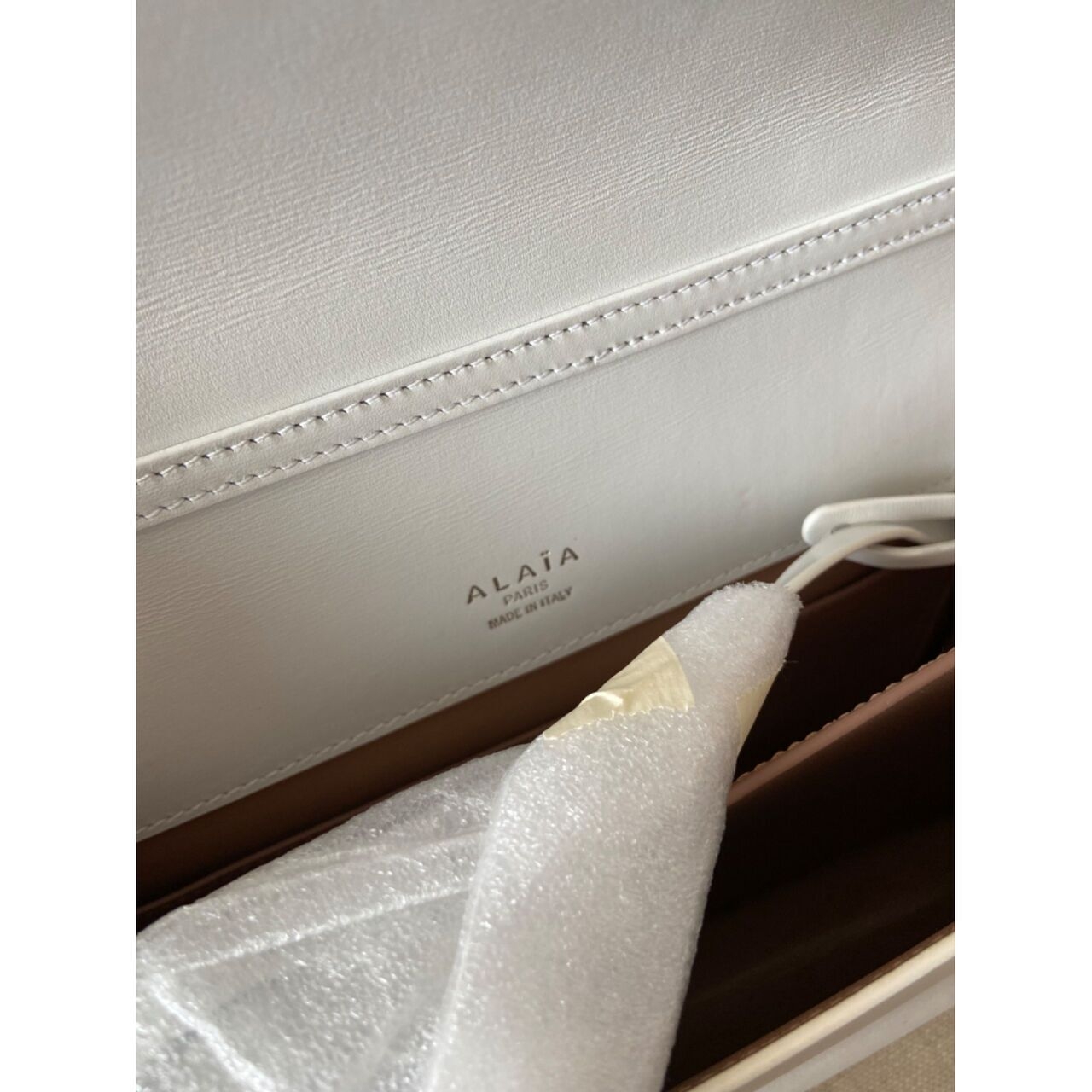 Alaia White Sling Bag