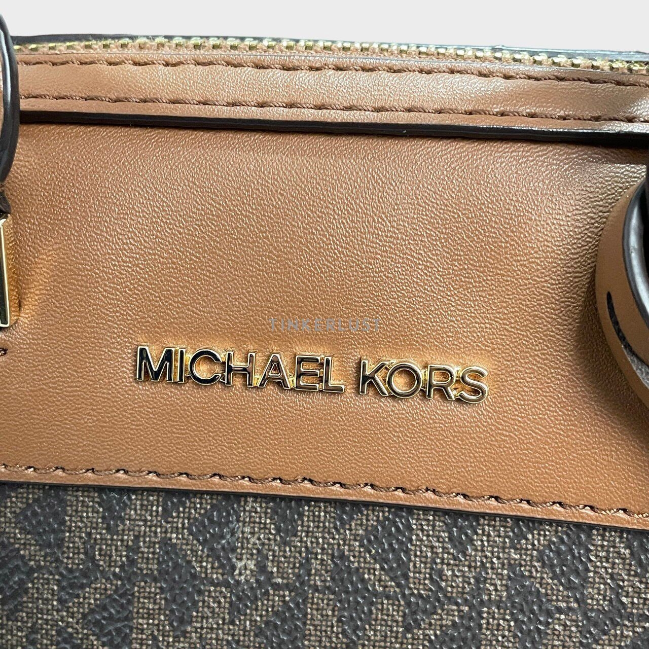 Michael Kors Brown Mini Duffle Sling Bag	
