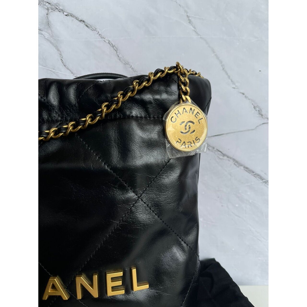Chanel Quilted C22 Mini Black Leather Chip GHW Sling Bag