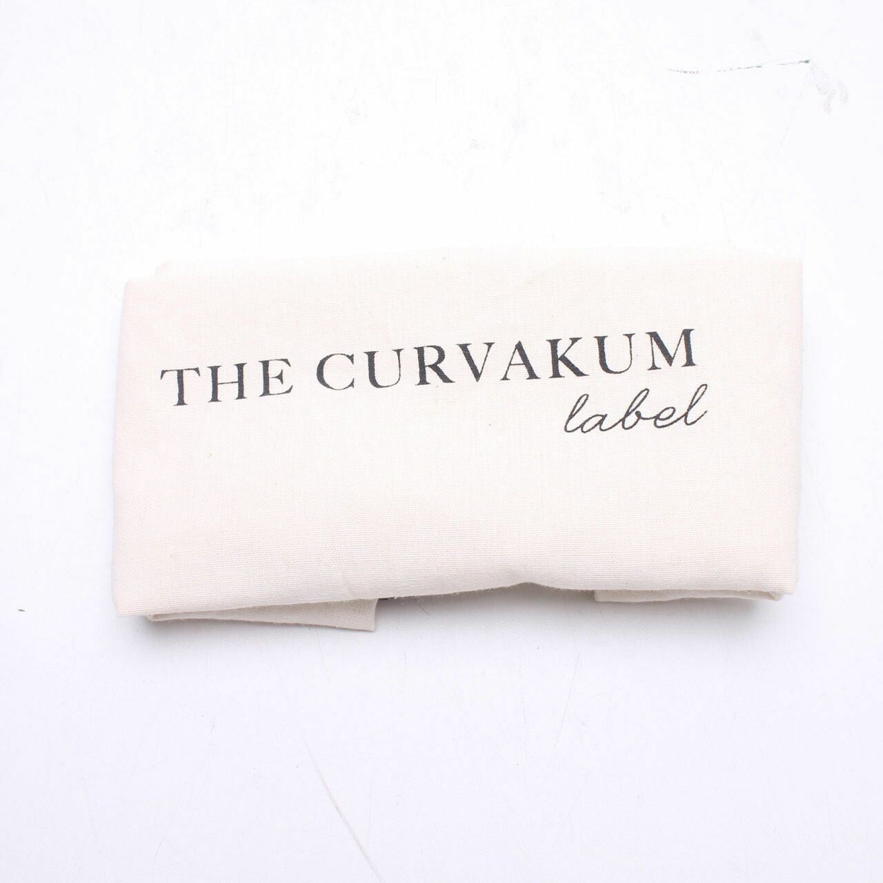 The Curvakum Label Multi Sling Bag
