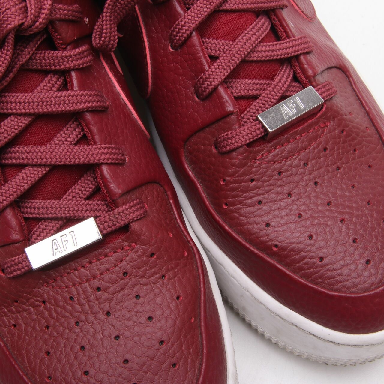 Nike Maroon Leather Sneakers