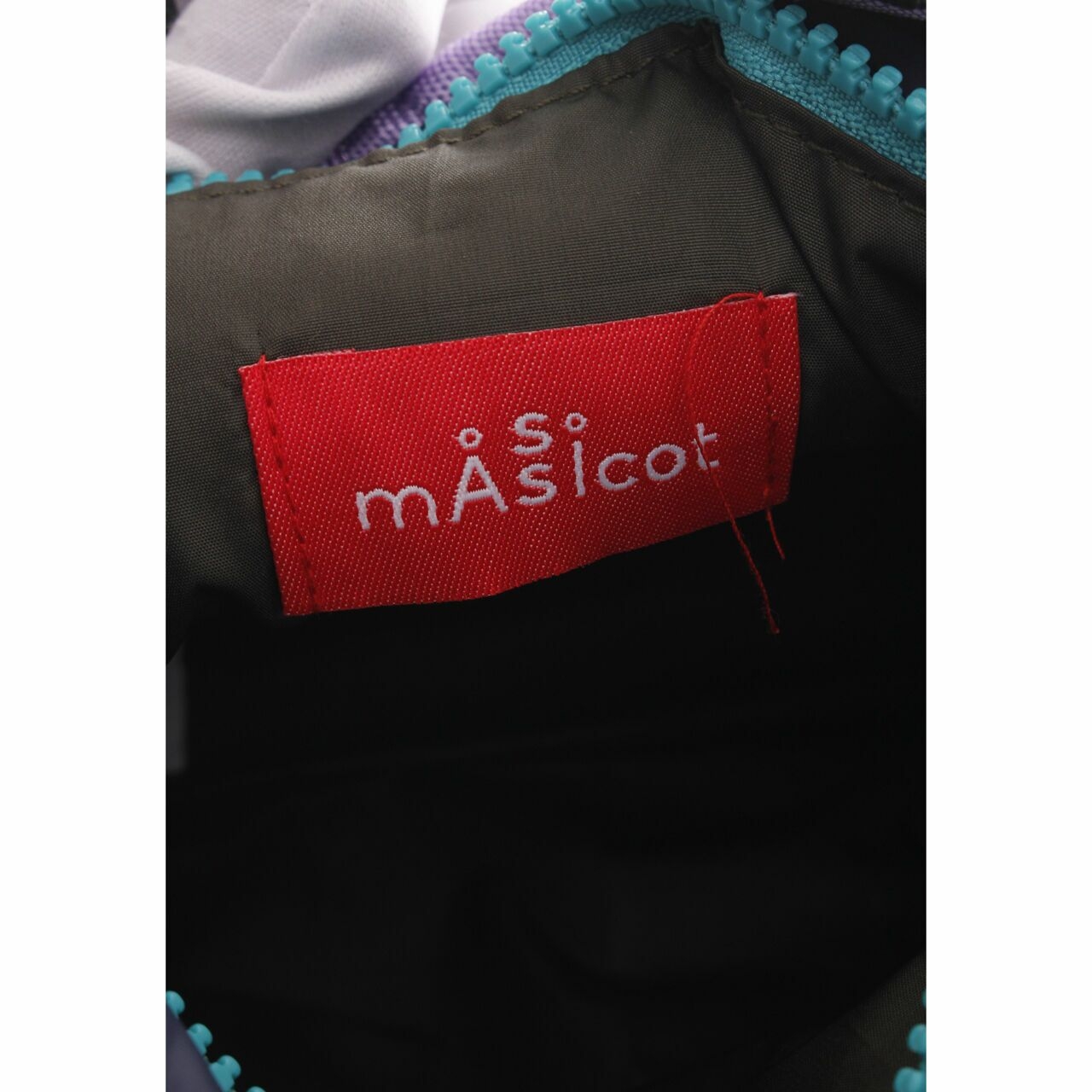Massicot Multi Pattern Sling Bag