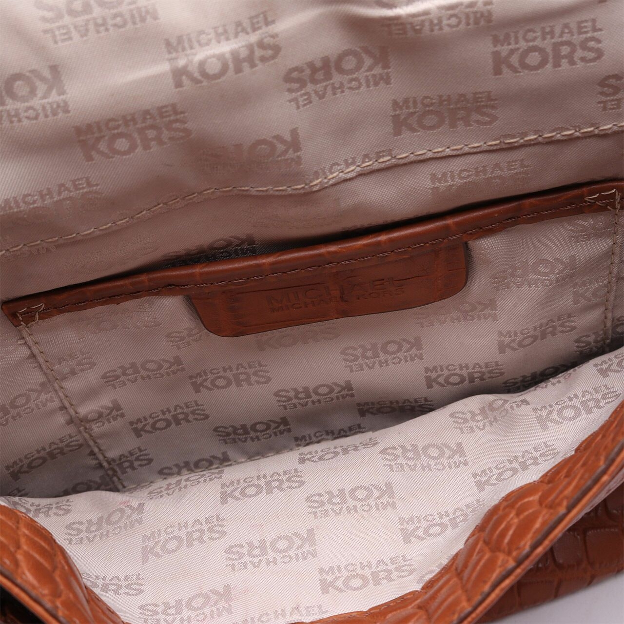 Michael Kors Brown Embossed Leather Sling Bag