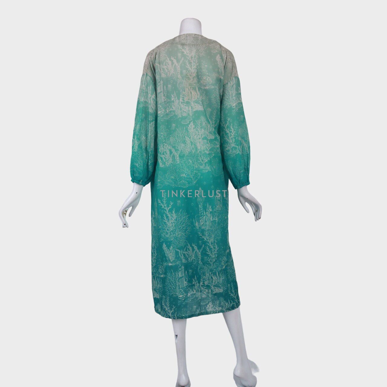 Benang Jarum Aquamarine Pattern Wrap Midi Dress
