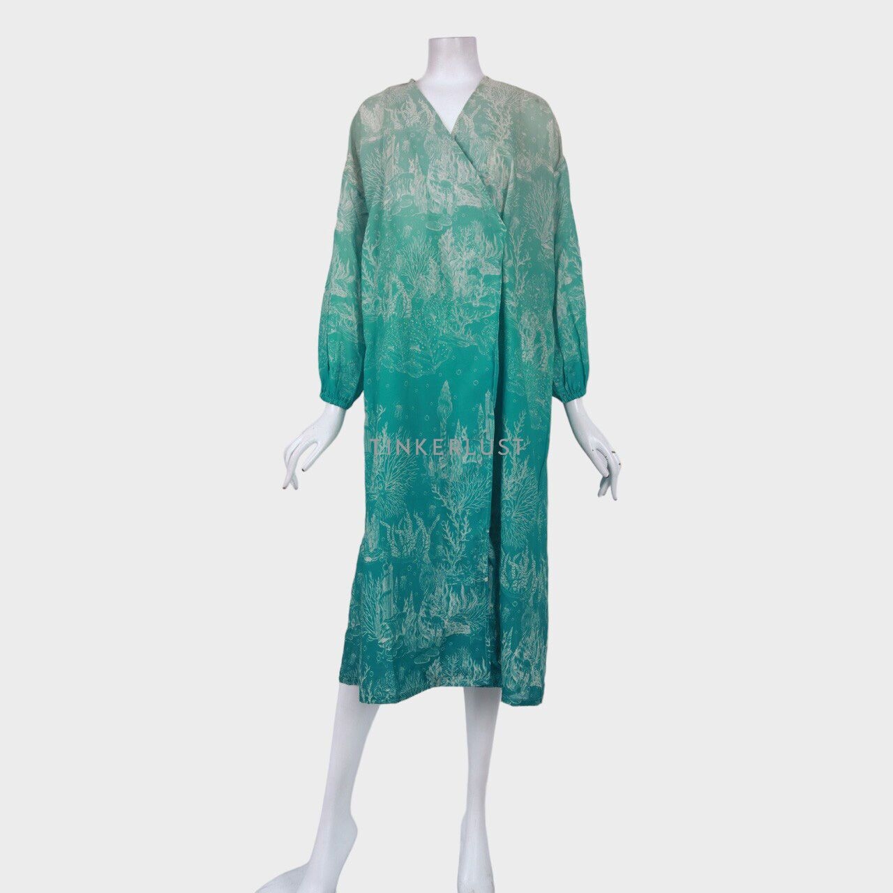 Benang Jarum Aquamarine Pattern Wrap Midi Dress