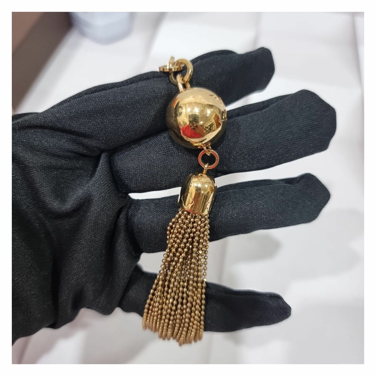 Louis Vuitton Porto Cle Swing Gold Keychain 