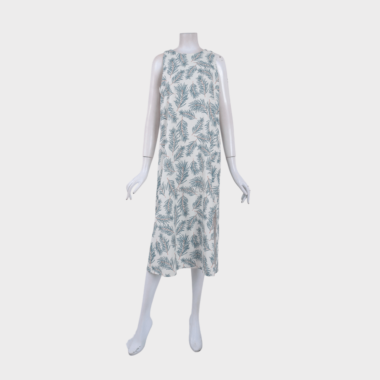 This is April Green & Off White Midi Dress