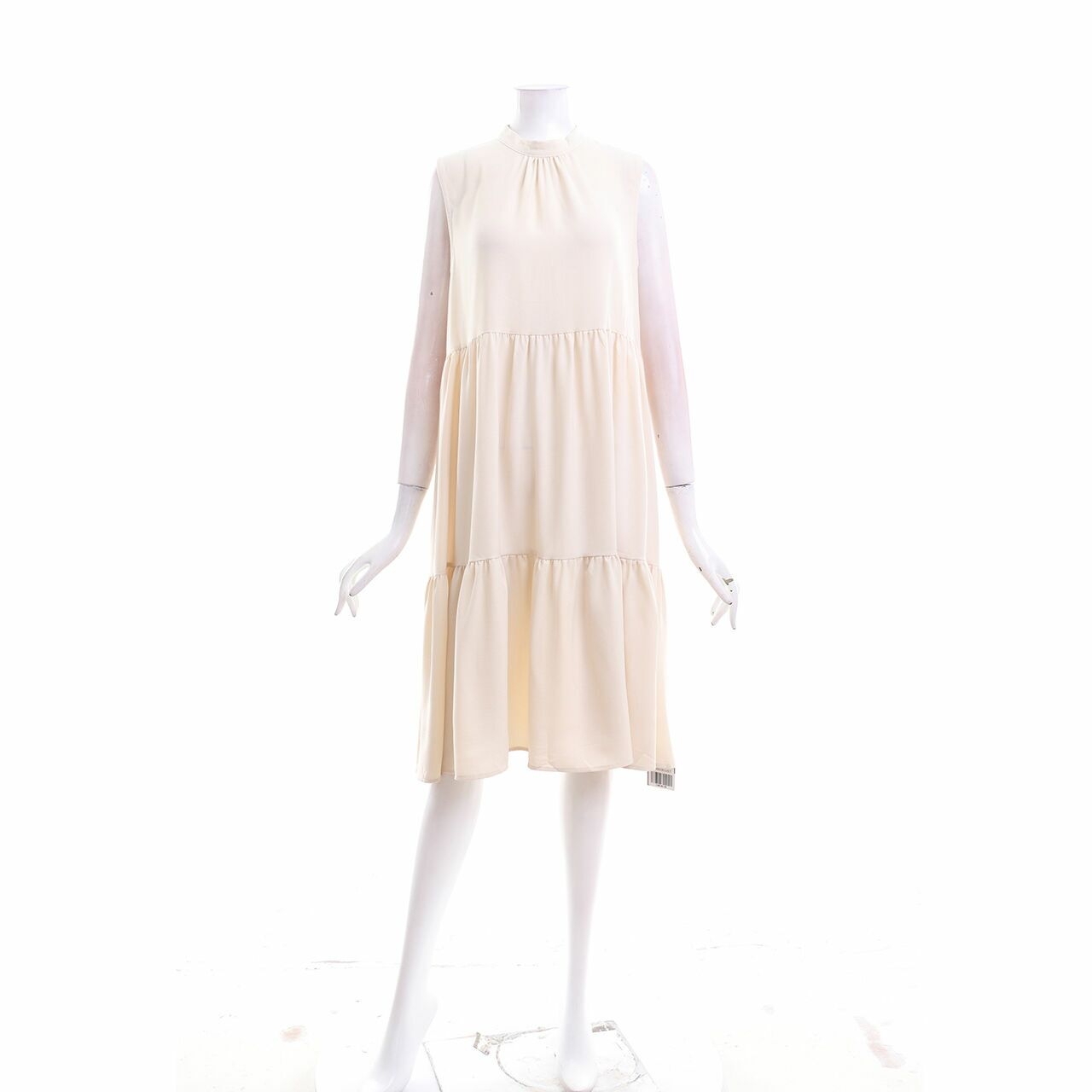 This is April Cream Midi Dress