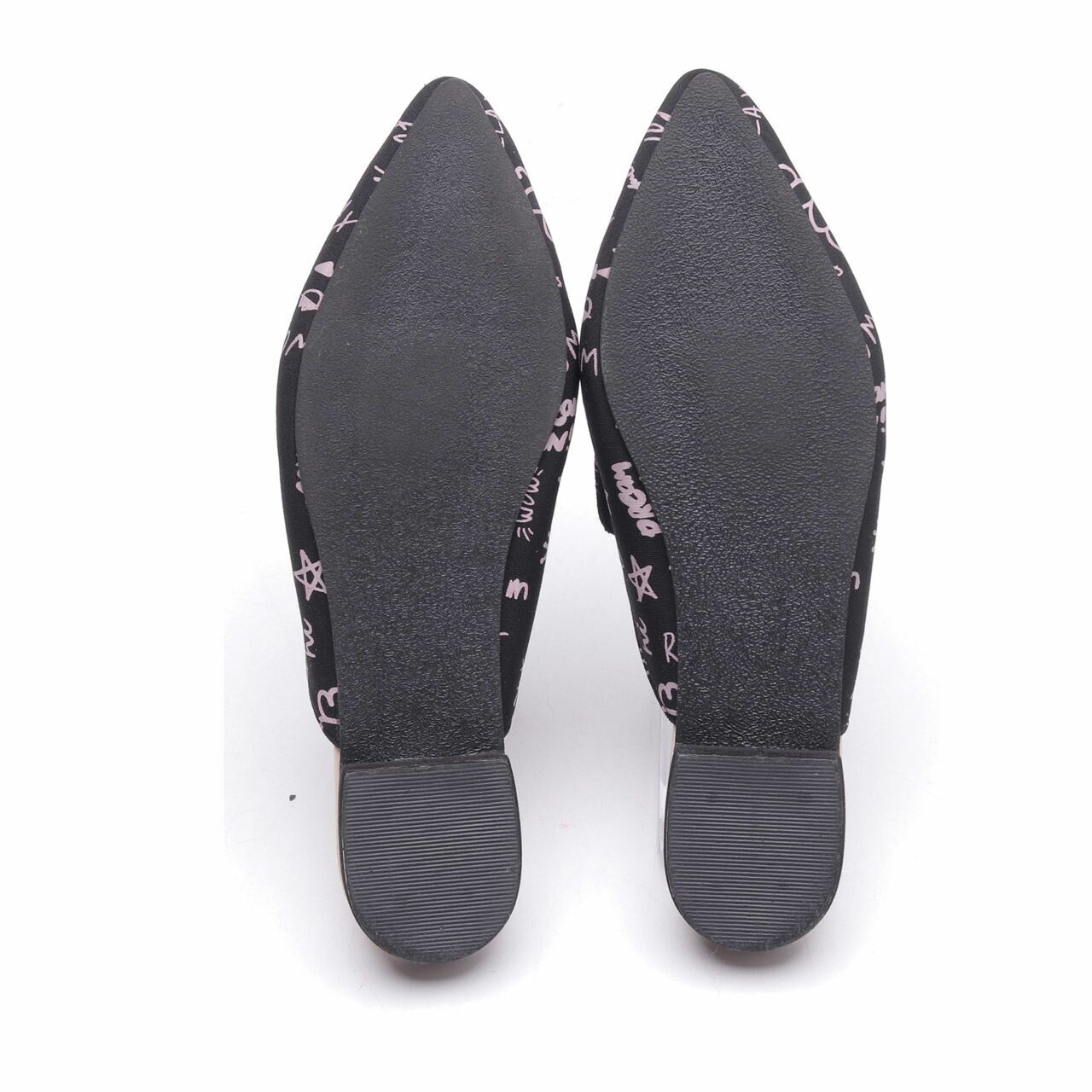 Valencia By Enrica Sassy Flats In Pebble Black Mules