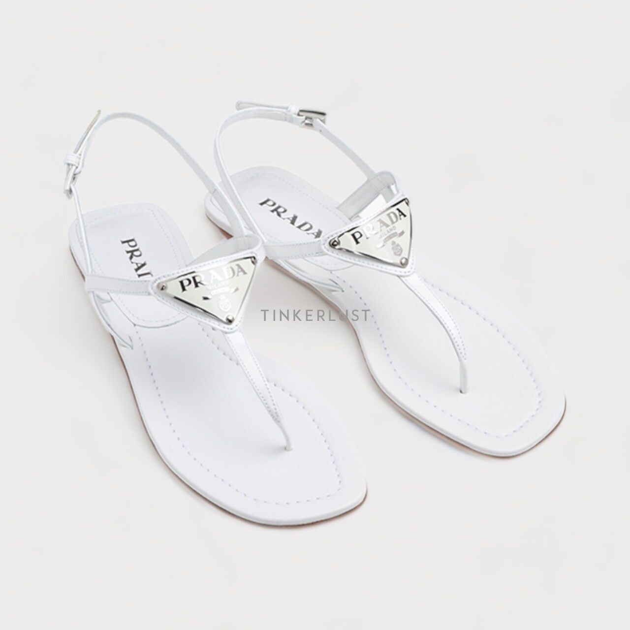 PRADA Thong Sandals in White Patent with Triangle Logo