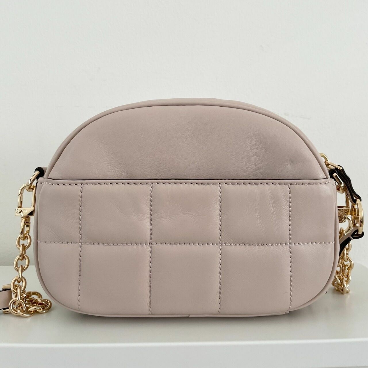 Michael Kors SoHo Oval Quilted Sling Bag - Soft Pink